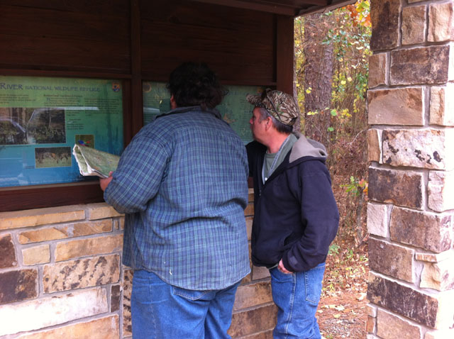 Biggjimm and CompressorMike are looking at the information center before we entered the area.
